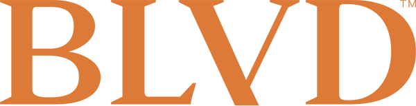 A solid orange background with no distinguishable objects.